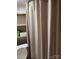 Practical bathroom with a simple, clean design featuring a shower curtain for privacy at 146 Trivette Trl, Mount Gilead, NC 27306