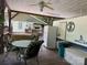 Cozy covered deck offers an inviting space for relaxation and entertainment at 146 Trivette Trl, Mount Gilead, NC 27306