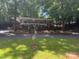 Charming covered porch home nestled in a lush, green, and private setting at 146 Trivette Trl, Mount Gilead, NC 27306