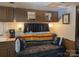 Cozy living area featuring comfortable seating, decorative pillows, and ample natural light at 146 Trivette Trl, Mount Gilead, NC 27306