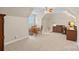 Bonus room offers versatile space with carpet and neutral walls, suitable for a game room, home office, or entertainment area at 166 Pinnacle Shores Dr, Mooresville, NC 28117