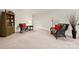 Cozy basement space featuring comfortable seating and a classic bookcase at 17028 River Race Dr, Huntersville, NC 28078