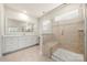 Bathroom with a large shower, and a spacious vanity with a large mirror at 17028 River Race Dr, Huntersville, NC 28078
