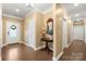 Spacious foyer with hardwood flooring and table creating a welcoming and stylish entrance at 17028 River Race Dr, Huntersville, NC 28078