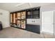 Garage featuring large cabinet with shelves and drawers for maximum storage at 17028 River Race Dr, Huntersville, NC 28078