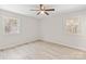 This is a bedroom with hardwood floors, windows, and ceiling fan at 174 Maske Rd, Mount Gilead, NC 27306