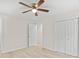 This is a bedroom with hardwood floors, walk in closet and a ceiling fan at 174 Maske Rd, Mount Gilead, NC 27306