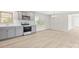 Open-concept kitchen area with stainless steel oven and microwave, and spacious dining area at 174 Maske Rd, Mount Gilead, NC 27306