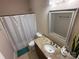 The bathroom features an updated vanity with a shower and new fixtures at 190 Watering Trough Rd, Statesville, NC 28677