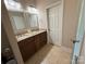 Bathroom features a double sink vanity with granite countertops at 190 Watering Trough Rd, Statesville, NC 28677