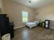 The bedroom has a window and a closet at 190 Watering Trough Rd, Statesville, NC 28677