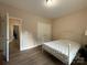 This bedroom has neutral colors with a closet and entry door visible at 190 Watering Trough Rd, Statesville, NC 28677