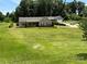 Beautiful view of a home with a well-maintained lawn and an attached garage at 190 Watering Trough Rd, Statesville, NC 28677