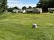 Expansive lawn frames this home with mature trees; great curb appeal and neighborhood feel at 190 Watering Trough Rd, Statesville, NC 28677