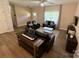 Spacious living room with hardwood floors, a modern fireplace, and lots of natural light at 190 Watering Trough Rd, Statesville, NC 28677