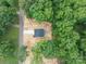 Aerial view of a new home surrounded by lush trees at 1941 32Nd Ne St, Hickory, NC 28601