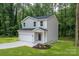 Charming two-story home with attached garage and landscaping at 1941 32Nd Ne St, Hickory, NC 28601