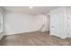 Open living space featuring wood-look flooring, stairs and natural light at 1941 32Nd Ne St, Hickory, NC 28601