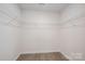 Spacious walk-in closet with wire shelving and durable floors offering ample storage at 1941 32Nd Ne St, Hickory, NC 28601