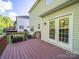 Backyard deck offering a private retreat, perfect for grilling and outdoor dining near sliding glass doors at 2111 Elendil Ln, Charlotte, NC 28269