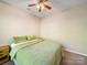 Bedroom featuring a small bed, nightstand and carpeted floor at 2111 Elendil Ln, Charlotte, NC 28269