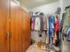 Walk-in closet with organized storage, shelves, and hanging space, providing ample room for clothes and accessories at 2111 Elendil Ln, Charlotte, NC 28269