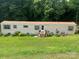 Charming single-story home with landscaped front yard, perfect for relaxing at 2165 Peanuts Ln, Newton, NC 28658