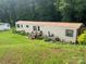 Well-maintained single-story home with a cozy front porch and lush green lawn at 2165 Peanuts Ln, Newton, NC 28658