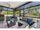 Relaxing screened porch featuring comfortable seating, perfect for enjoying the outdoors in comfort and style at 2458 Genelia Dr, Claremont, NC 28610