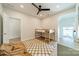 This bedroom includes a bunk bed, ceiling fan, hardwood floors, and a neutral color palette at 2714 Woodlands Creek Dr, Monroe, NC 28110