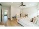 Stylish bedroom with plush bed, hardwood floors, and windows offering natural light at 2714 Woodlands Creek Dr, Monroe, NC 28110