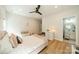 Stylish bedroom with plush bed, hardwood floors, with bathroom entrance at 2714 Woodlands Creek Dr, Monroe, NC 28110