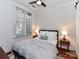 Comfortable bedroom with a cozy bed and plenty of natural light at 2810 Selwyn Ave # 104, Charlotte, NC 28209