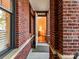 Inviting entryway featuring a glimpse into the home's interior living space at 2810 Selwyn Ave # 104, Charlotte, NC 28209