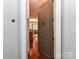 Entryway and hallway with hardwood floors at 2810 Selwyn Ave # 104, Charlotte, NC 28209