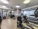 Gym with cardio equipment, free weights, and mirrors at 2810 Selwyn Ave # 104, Charlotte, NC 28209