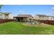 Backyard view featuring a covered deck, green lawn, and fenced in area at 286 Mallard Head Dr, Rock Hill, SC 29732