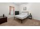Bedroom featuring neutral carpeting, a bed frame and complementary furniture at 286 Mallard Head Dr, Rock Hill, SC 29732