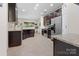 Well-equipped kitchen featuring stainless steel appliances and a breakfast bar at 286 Mallard Head Dr, Rock Hill, SC 29732