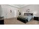 Spacious main bedroom with soft carpet, tray ceiling, and neutral color palette at 286 Mallard Head Dr, Rock Hill, SC 29732