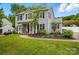 Charming two-story home with a manicured lawn and inviting curb appeal at 314 Sunnywood Ln, Charlotte, NC 28270