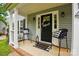 Inviting front porch featuring a 'Welcome' mat and comfortable seating at 314 Sunnywood Ln, Charlotte, NC 28270