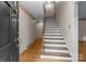 Spacious foyer featuring hardwood floors and a staircase at 3209 Sedgefield Rd, Statesville, NC 28625