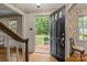 Foyer with a black front door and view of front yard at 3209 Sedgefield Rd, Statesville, NC 28625