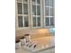 Bright kitchen cabinets feature frosted glass panes, with decorative items displayed on the counter at 3209 Sedgefield Rd, Statesville, NC 28625