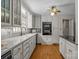 A well-lit kitchen features a double oven, stainless steel appliances and hardwood floors at 3209 Sedgefield Rd, Statesville, NC 28625