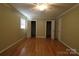 Spacious bedroom with hardwood floors and ample closet space, offering comfort and convenience at 344 Lucas Rd, Star, NC 27356