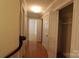 Hallway with hardwood flooring and closet storage at 344 Lucas Rd, Star, NC 27356