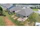 Drone shot showcasing this home's backyard, stone fire pit, and community setting at 3735 Norman View Dr, Sherrills Ford, NC 28673