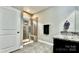 This bathroom features a glass enclosed shower, granite countertops, and tile flooring at 3735 Norman View Dr, Sherrills Ford, NC 28673